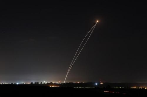 A rocket fired from Gaza is intercepted by an Israeli Iron Dome anti-missile defence system